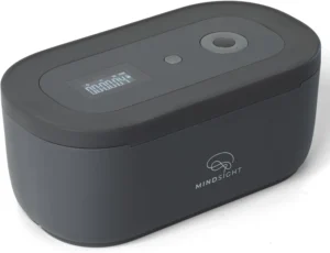 The Mindsight Timed Lock Box in Glacier Gray, shown closed on a kitchen counter.